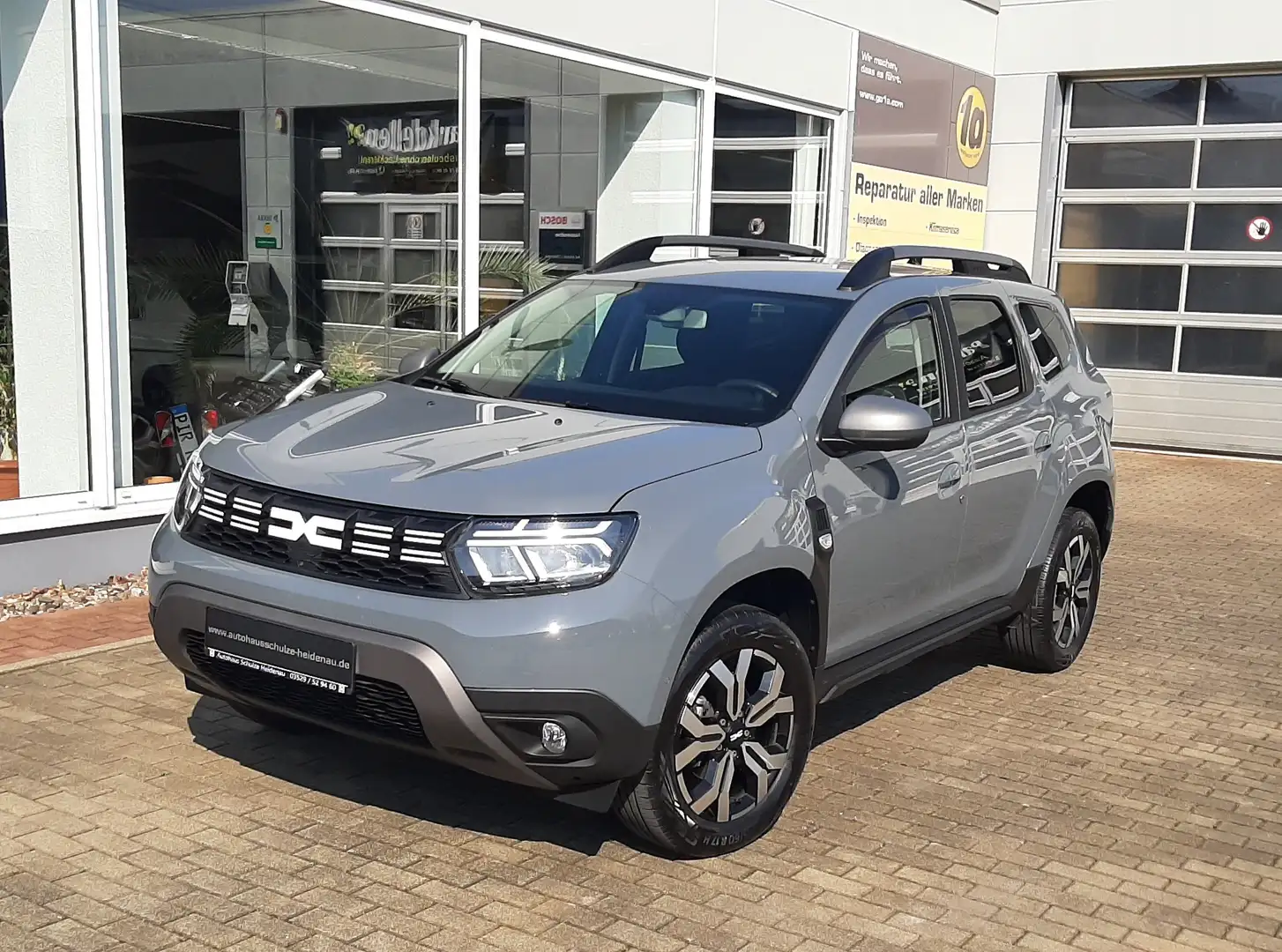 Dacia Duster TCe150 EDC Journey KLIMAAUTO+NAVI+KAMERA+AHZV Grau - 1