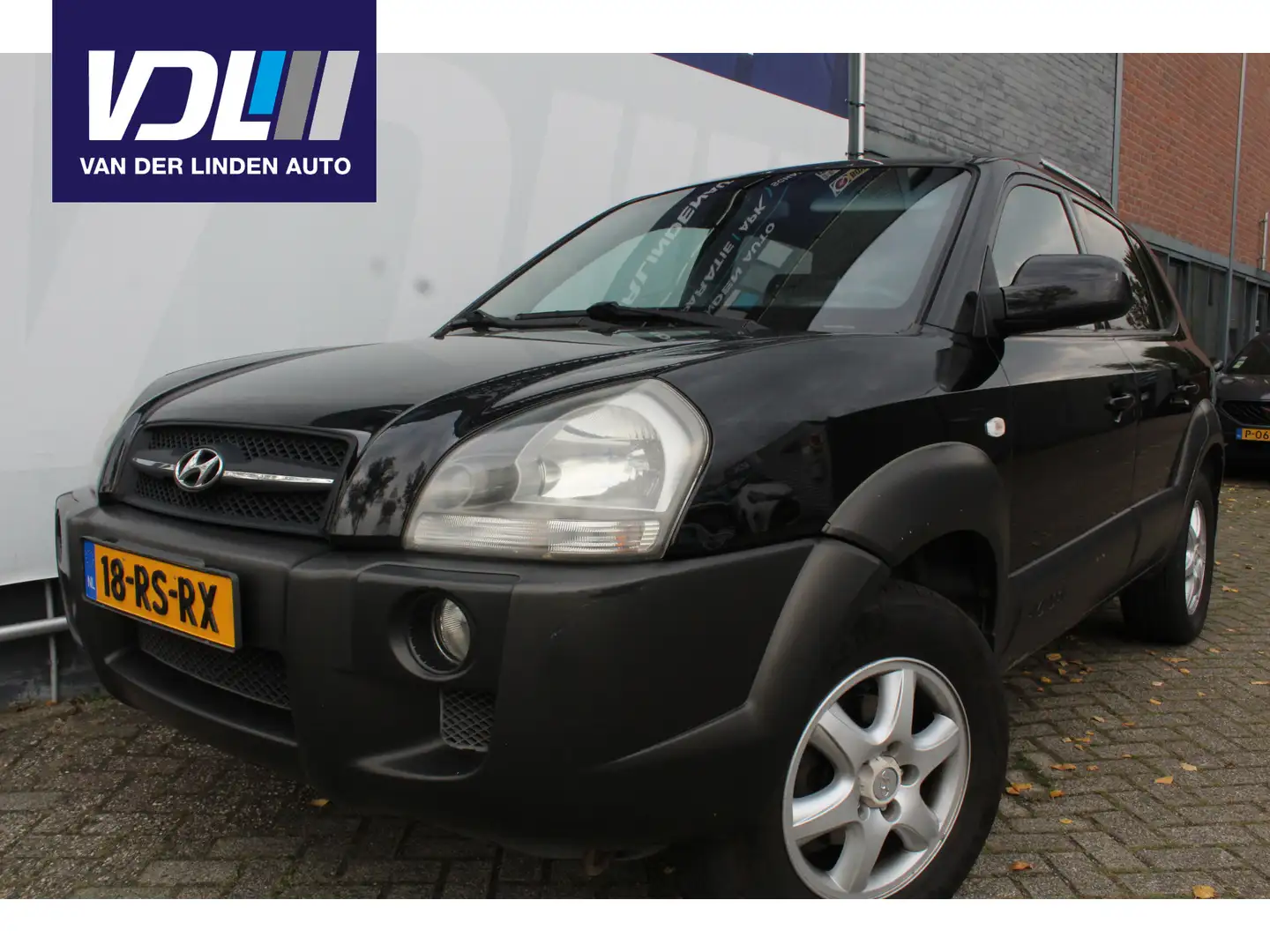 Hyundai TUCSON 2.0i Style Airco l Lm-Velgen l Bluetooth l Trekhaa Zwart - 1
