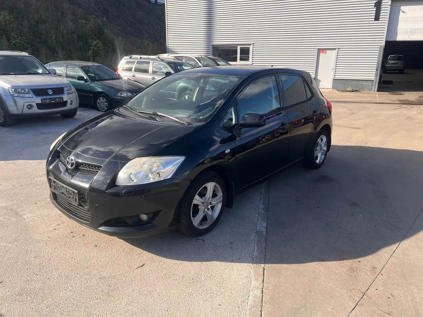 Toyota Auris Auris 1.4i VVT-i Linea Luna Zwart - 1