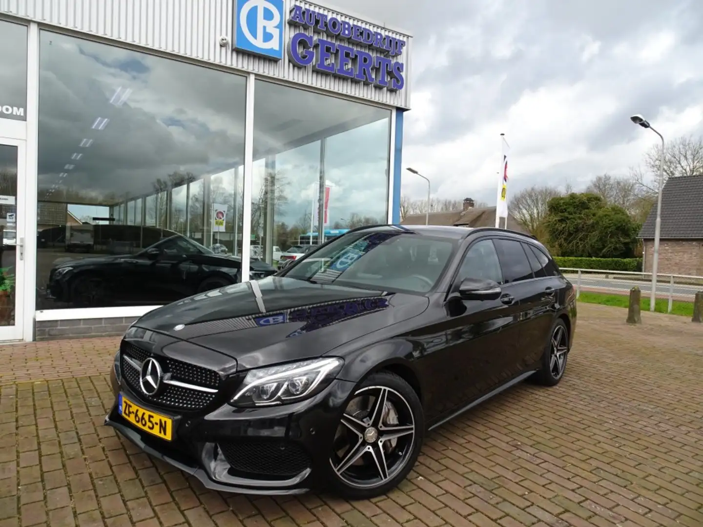 Mercedes-Benz C 450 C450 AMG 4MATIC 370pk Leder/360 camera/Trekhaak/St Zwart - 1