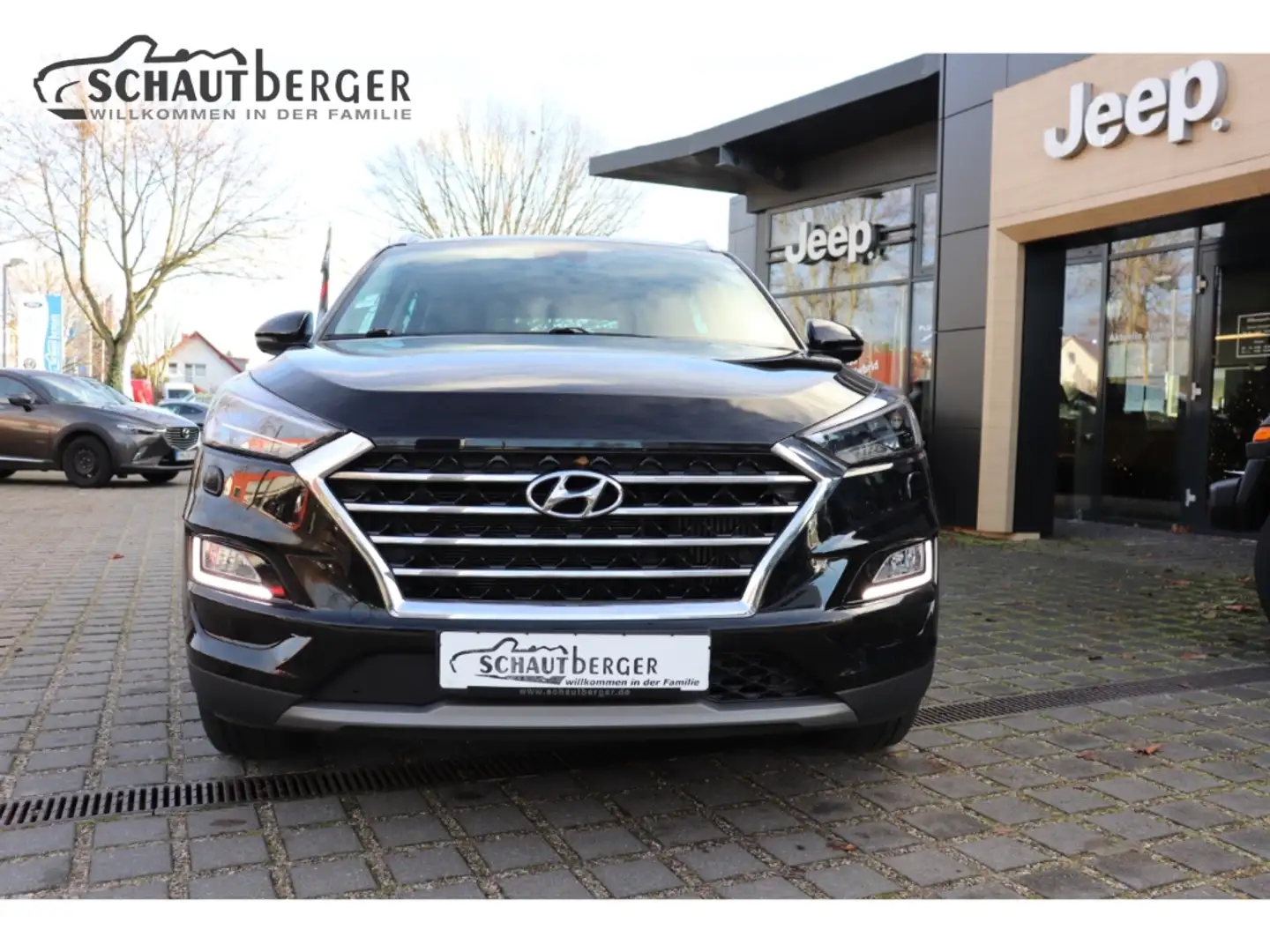 Hyundai TUCSON Premium Mild-Hybrid 4WD inkl. WR-Satz, Navi, R-Kam Schwarz - 2