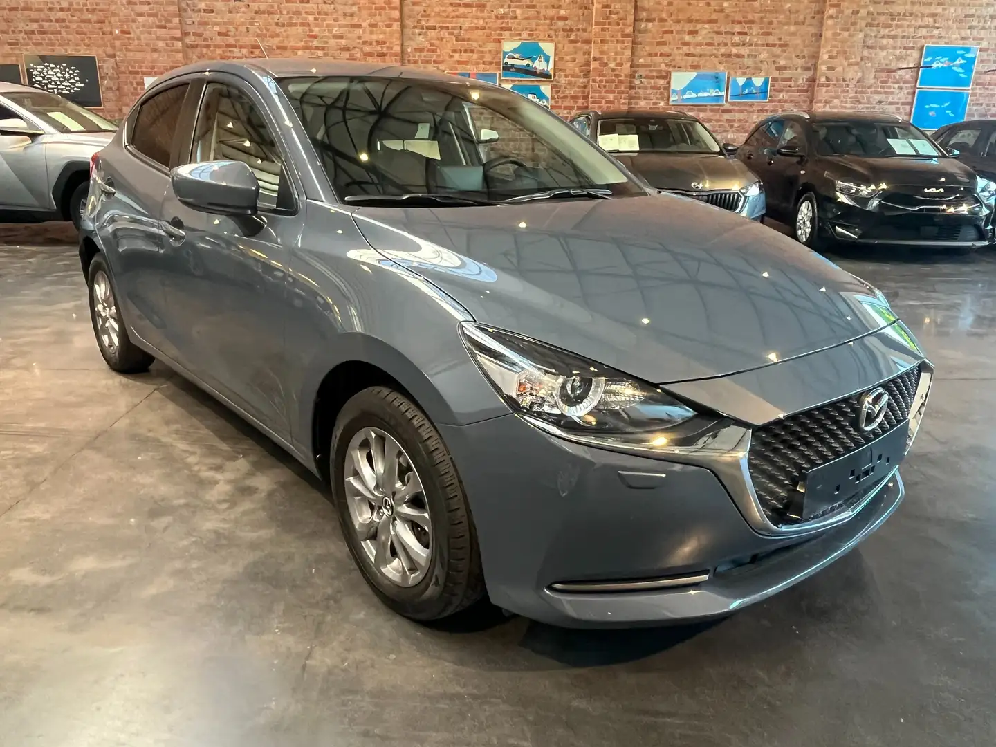 Mazda 2 1.5i e-Skyactiv-G MHEV Skydrive Grijs - 1