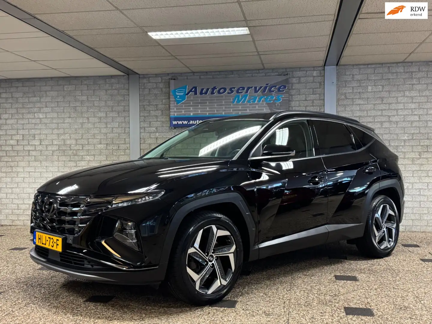Hyundai TUCSON 1.6 T-GDI HEV Premium, 360 Camera, navi, leder, ad Zwart - 1