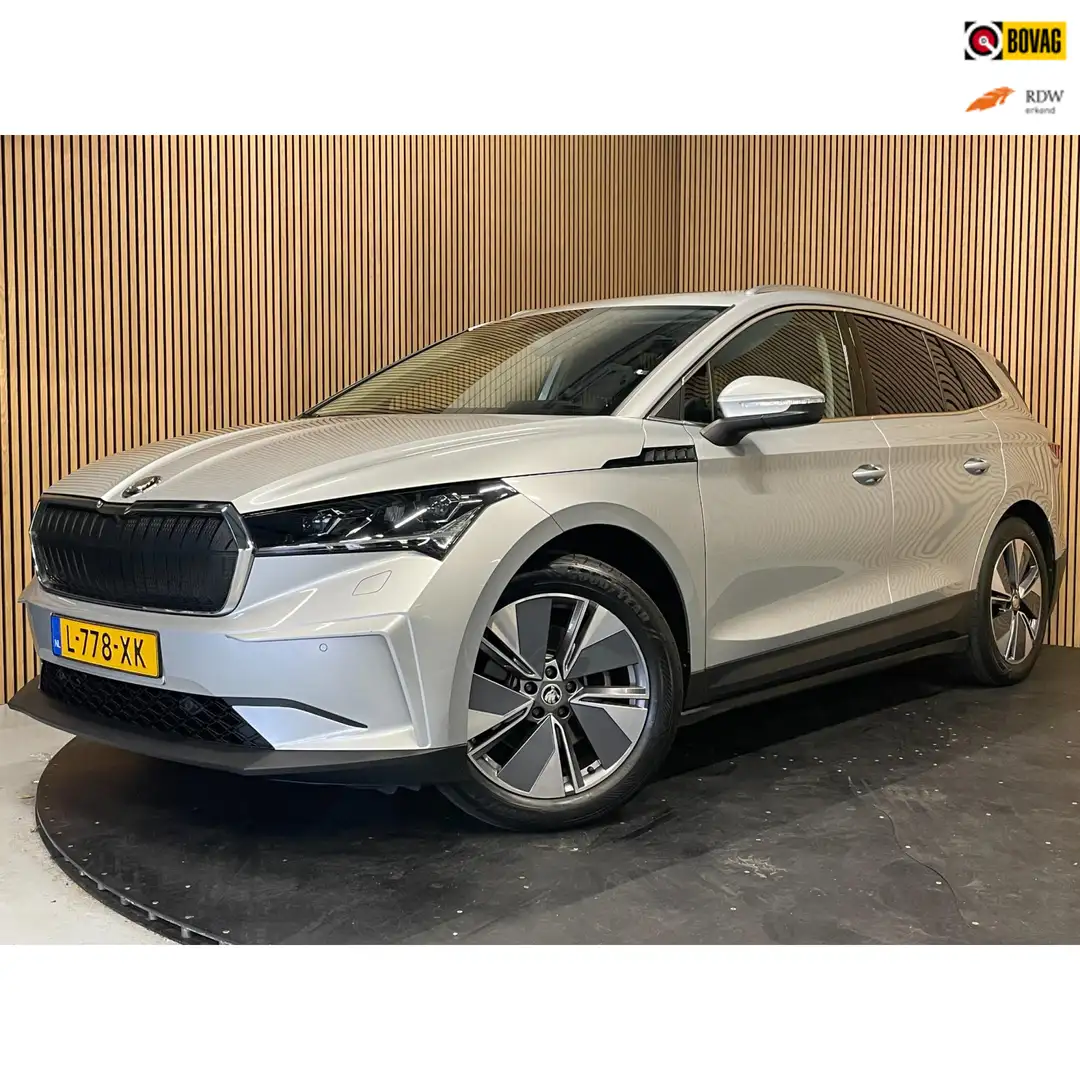 Skoda Enyaq iV 60 |TREKHAAK|PANO|1/2 LEDER|CARPLAY|CAMERA|ACC| Grijs - 1