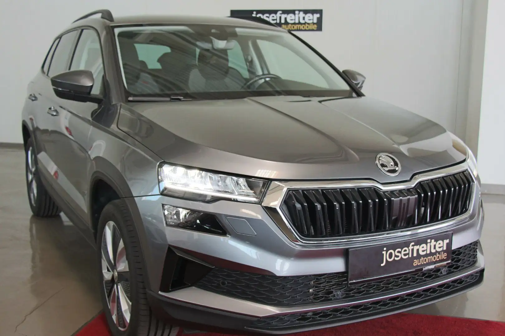Skoda Karoq Style 4x4 2.0 TDI DSG AHK/ACC/NAVI/Standhzg. Grau - 1