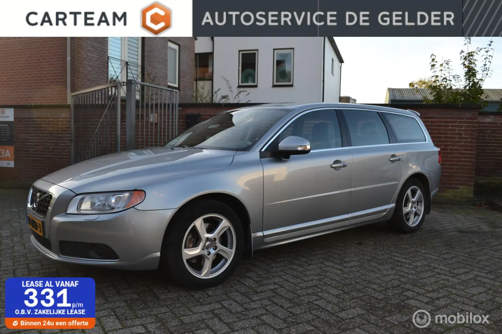 Volvo V70 3.2 Summum | Leer | BLIS | Xenon | Trekhaak | Keyl Grijs - 1