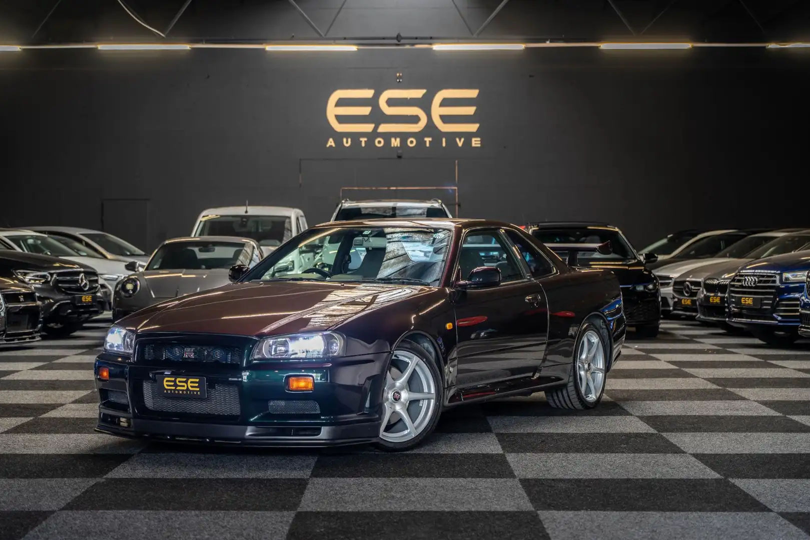 Nissan Skyline R34 GTR V-spec Midnight Purple II Burdeos - 1