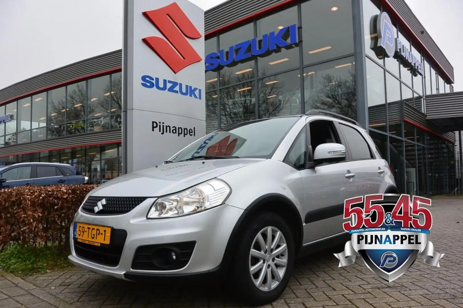 Suzuki SX4 1.6 Executive 5-deurs Airco / Stootlijstset / Navi Argento - 1