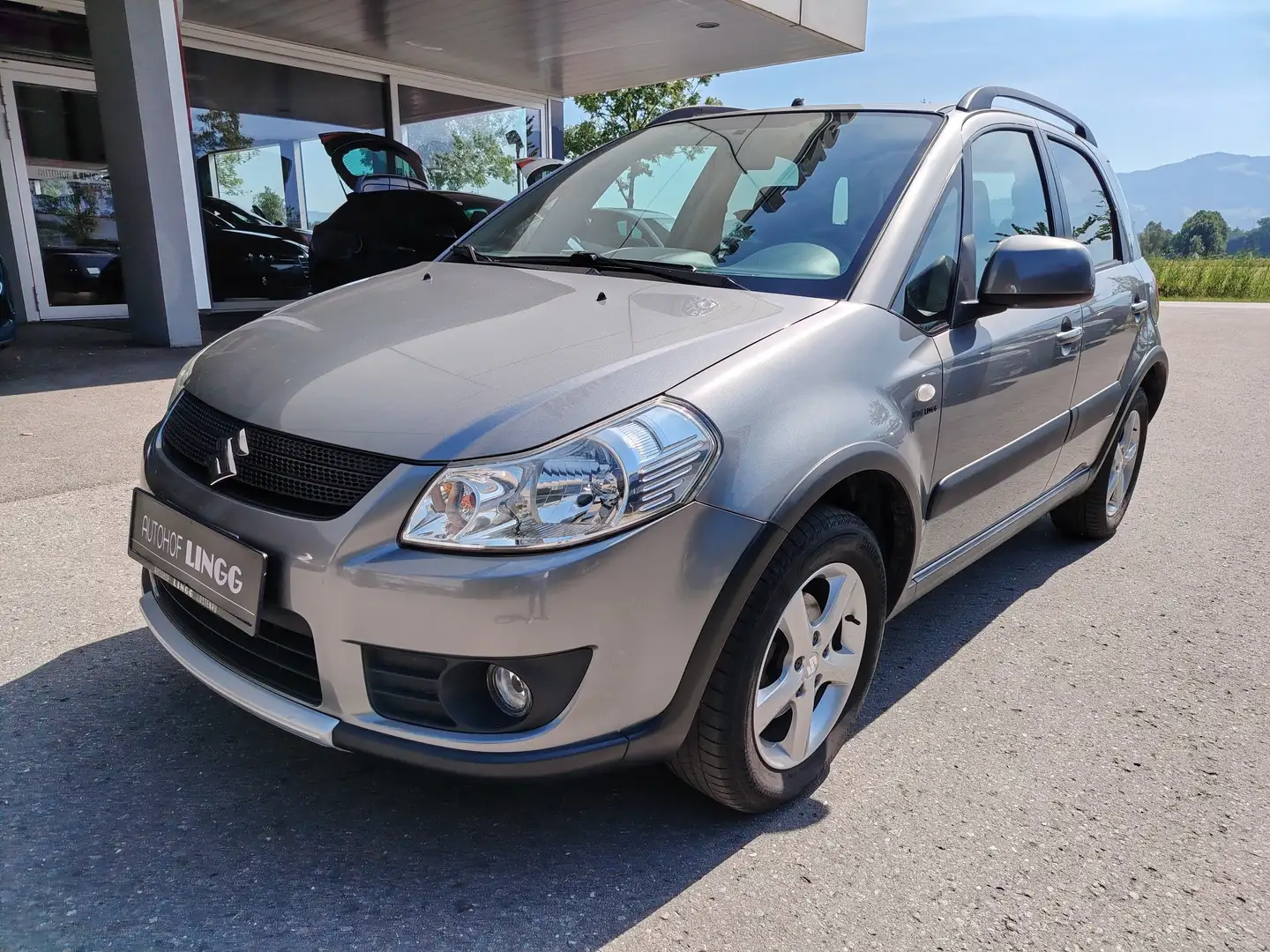 Suzuki SX4 1,6 GL 4WD deluxe Grau - 1