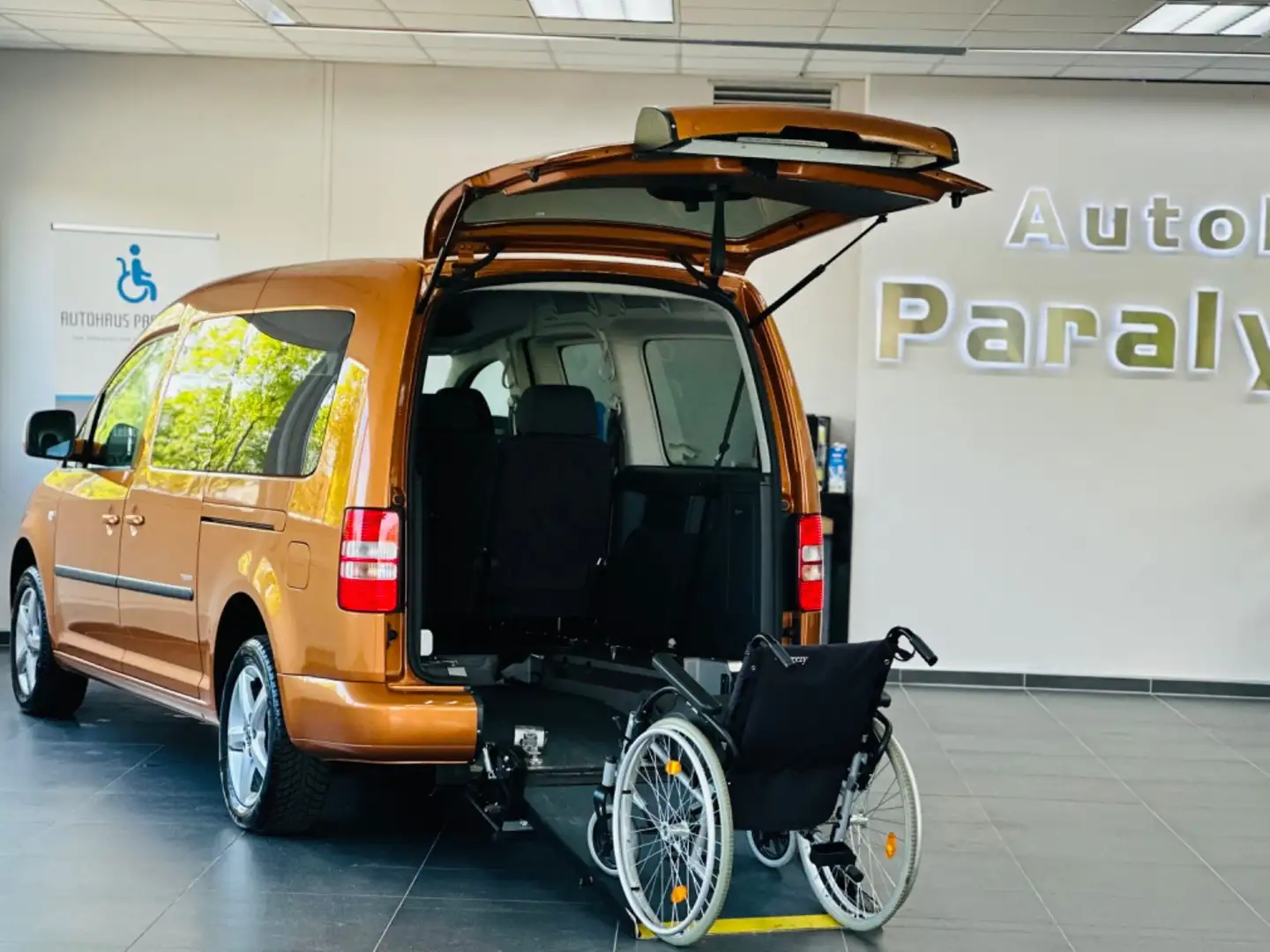Volkswagen Caddy Maxi Team 1.6 TDI Behindertengerecht-Rampe Pomarańczowy - 1