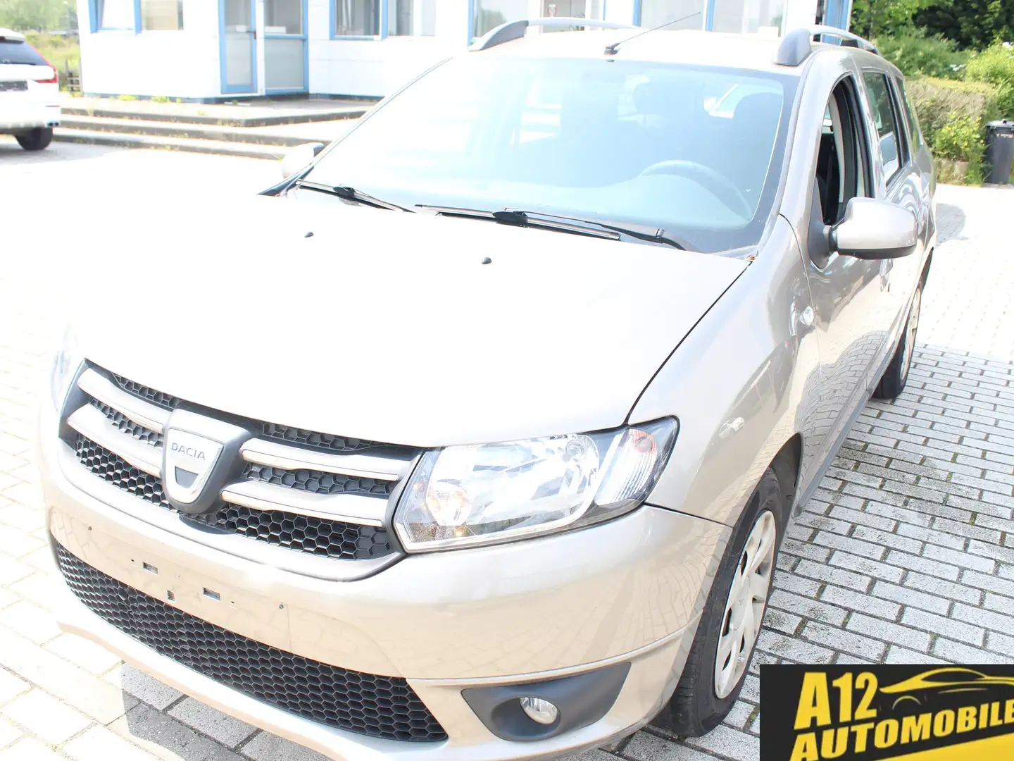 Dacia Logan 0.9 TCe | Ambiance | Navi | Airco | 12m garantie | Braun - 1