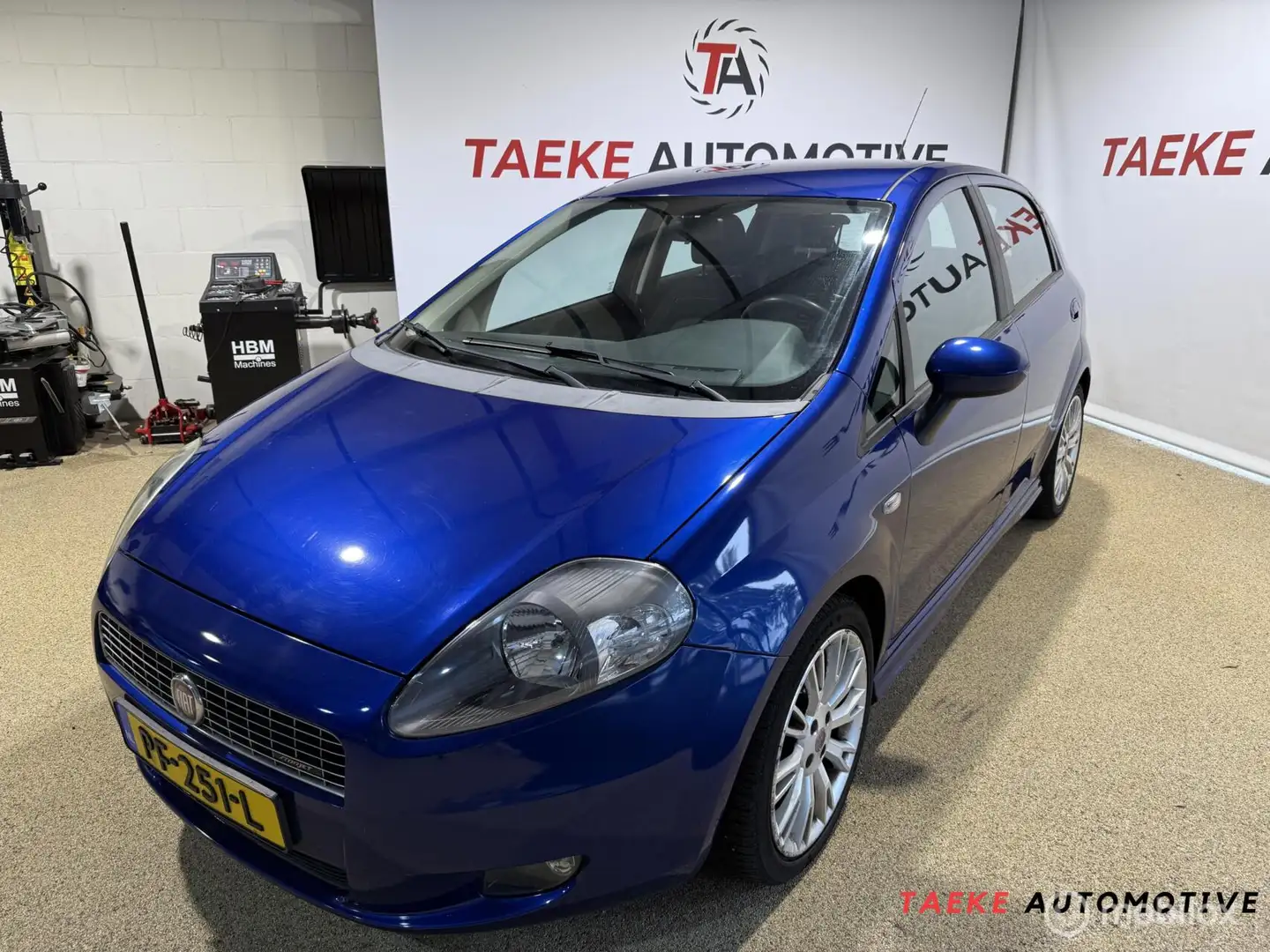 Fiat Grande Punto 1.4-16V Edizione Lusso Airco Azul - 1