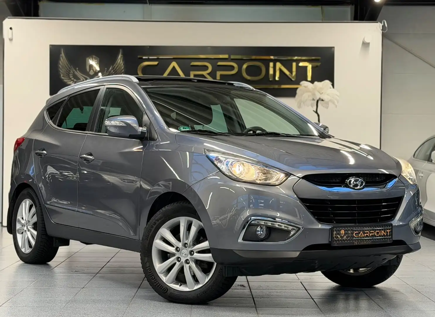 Hyundai iX35 Style 2WD/LED/Leder/Navi/PANO/BT/4xSHZ Grau - 1