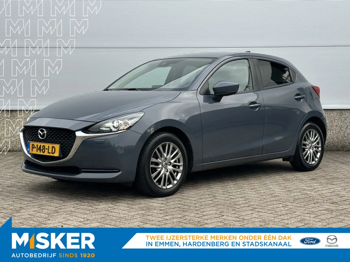 Mazda 2 1.5 90pk Style Selected, navi, cruise, airco, trek Grau - 1