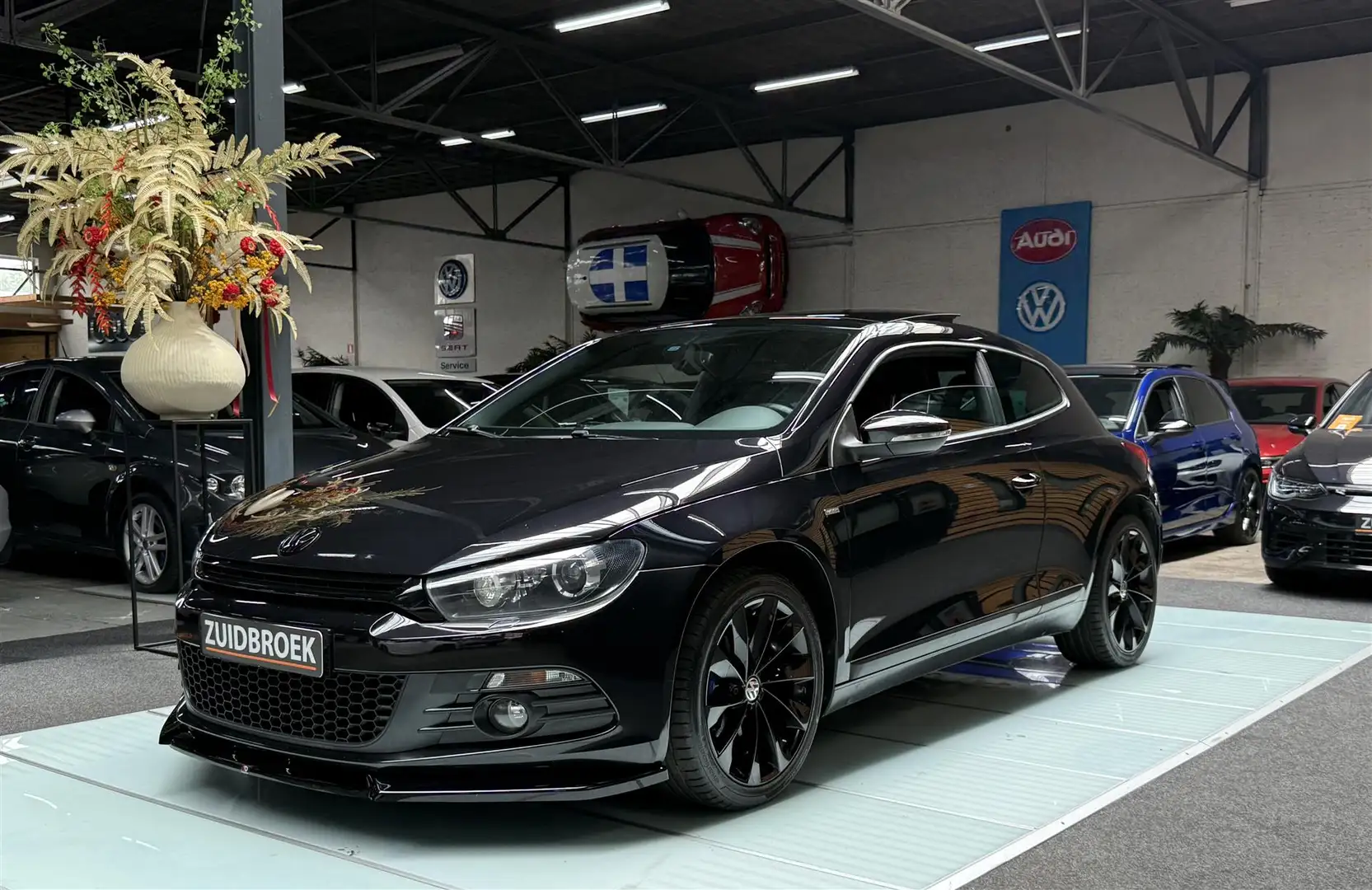 Volkswagen Scirocco 1.4 TSI 122PK Match Pano Xenon Clima Zwart - 1