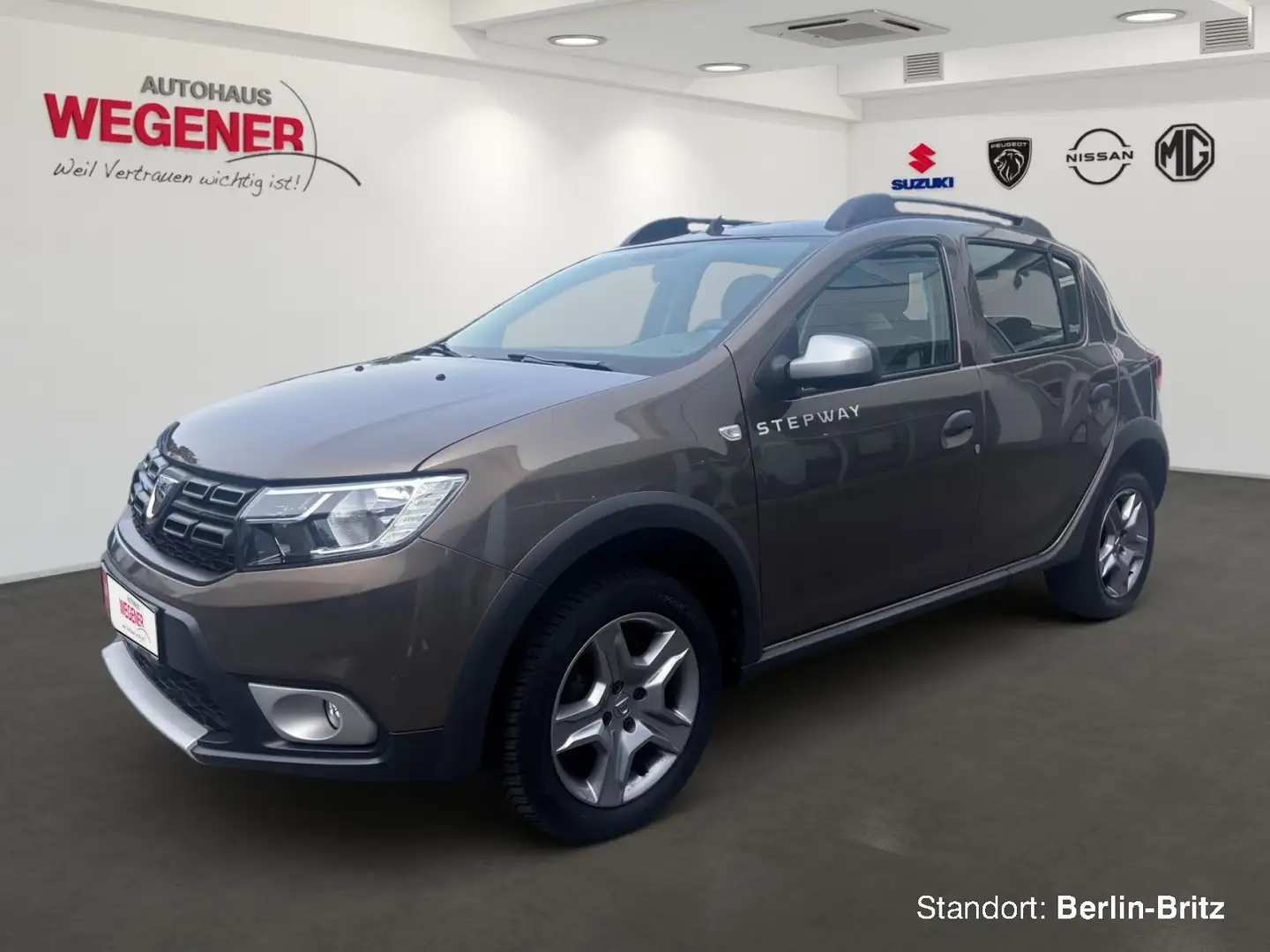 Dacia Sandero SANDERO STEPWAY PRESTIGE MT +Navi+Allwetter+PDC+ Braun - 1