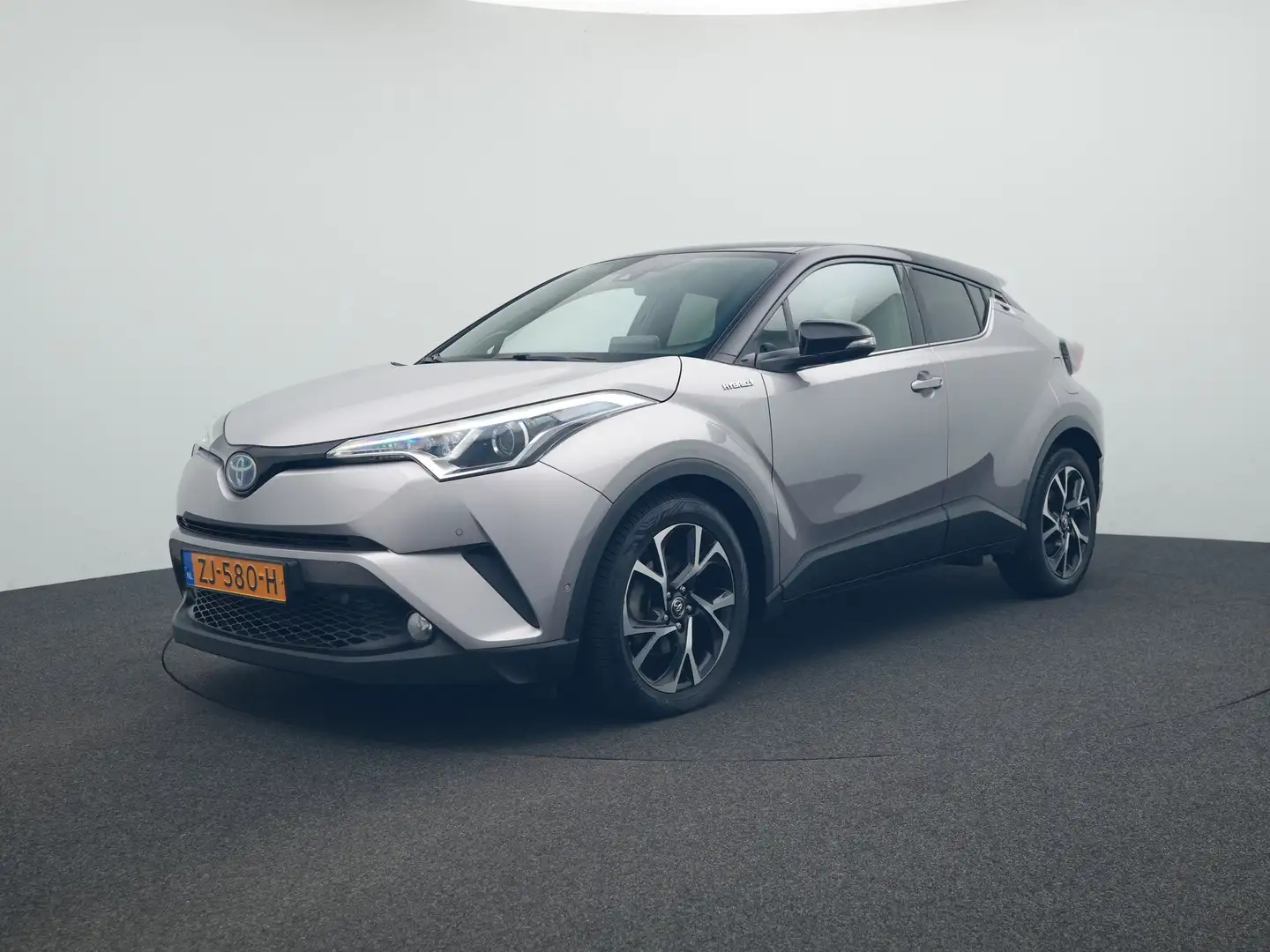 Toyota C-HR 1.8 Hybrid Style | NL-Auto | JBL-Audio | Grijs - 1
