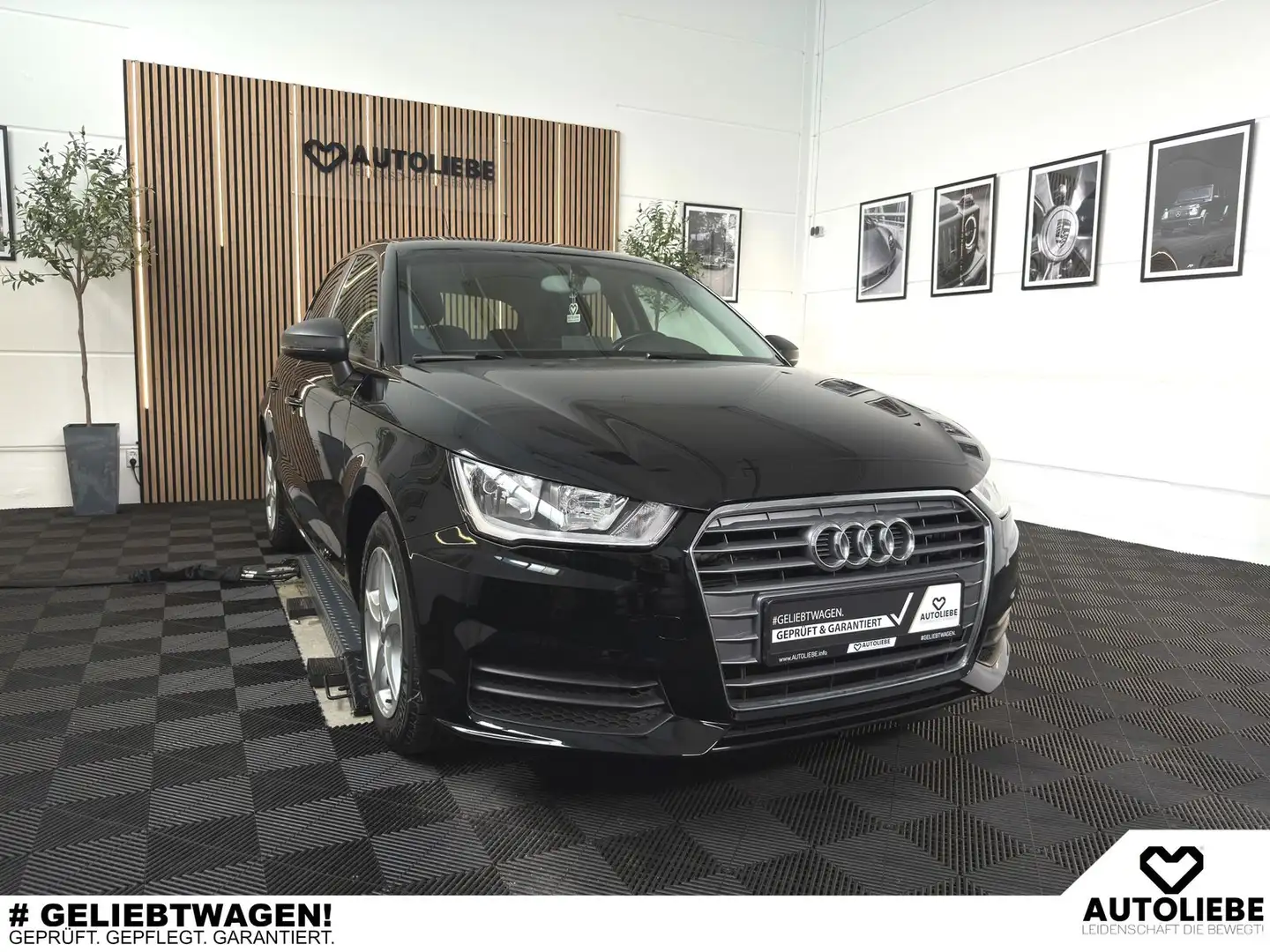 Audi A1 1.0 TFSI Sportback NAVI*SHZ*PDC*1HAND Schwarz - 1