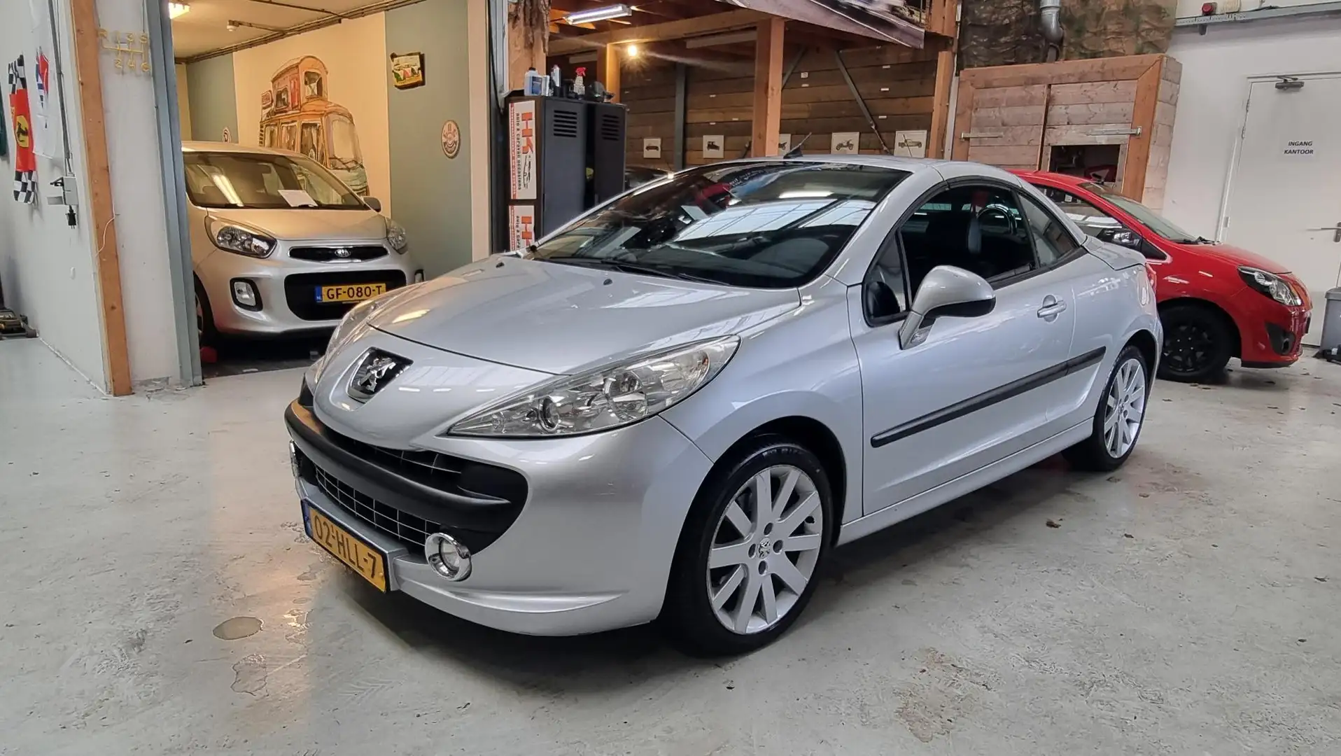 Peugeot 207 CC 1.6 VTi Féline LEER, Clima, 1e eigenaar, NAP Gris - 1