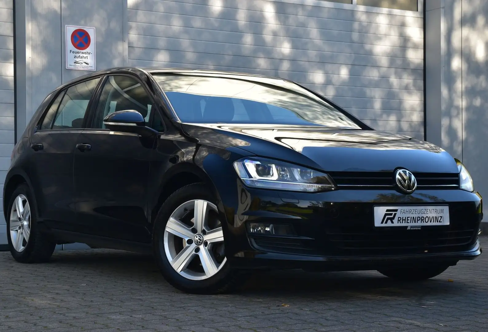 Volkswagen Golf Comfortline BMT 1.HAND/Bi-Xenon/Navi/Tempo. Schwarz - 1