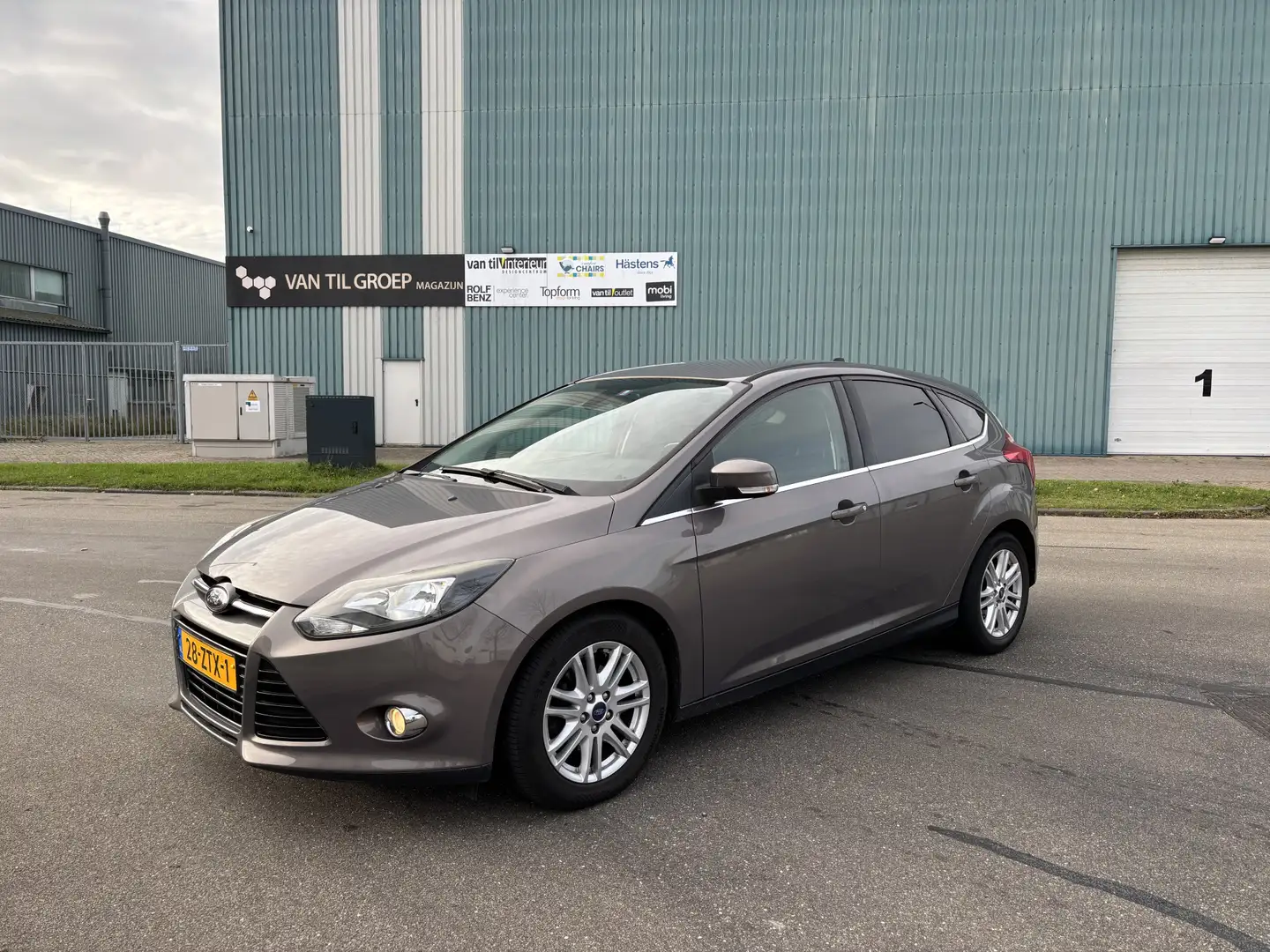 Ford Focus 1.0i EcoBoost Titanium 6-Bak 125 PK. Zuinige en ze Brun - 1