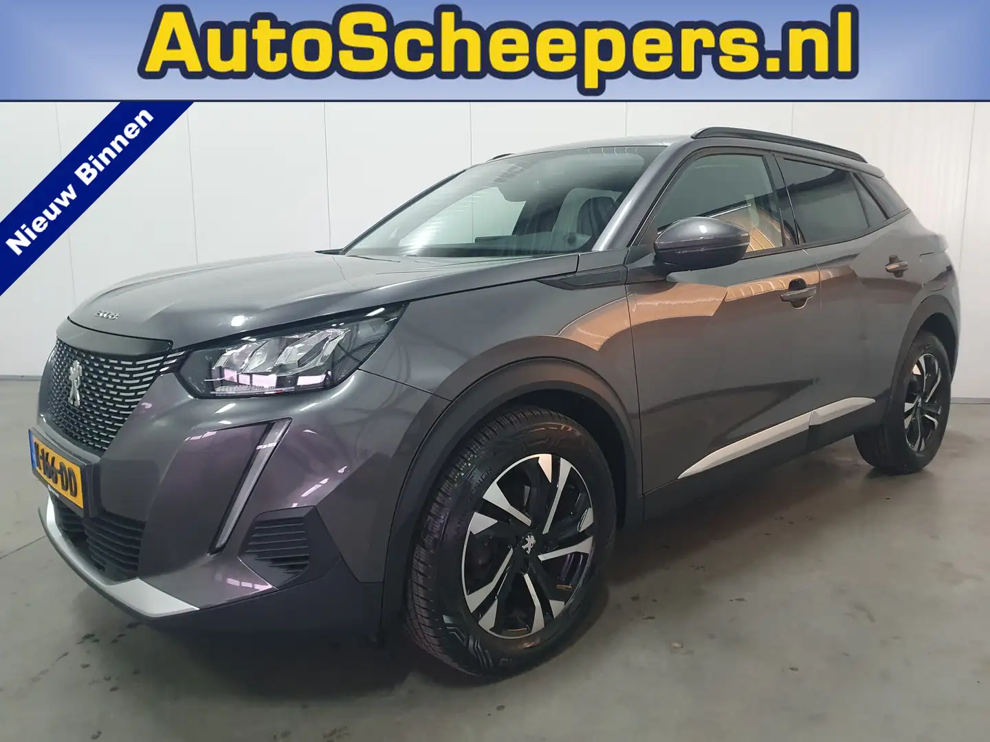 Peugeot 2008 1.2 PureTech Allure NAVI/PDC/TRHAAK/LED/CRUISE/LMV Gris - 1
