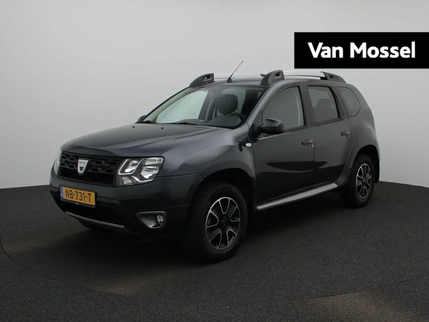 Dacia Duster 1.2 TCe 4x2 Blackshadow | Trekhaak | All-Seasonban Grijs - 1