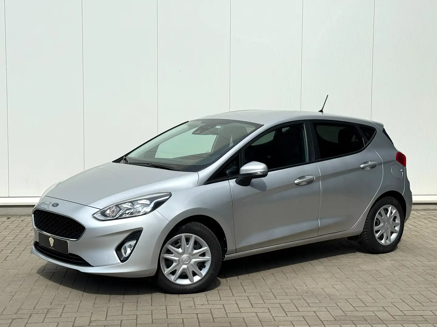 Ford Fiesta ✅ 1.1i GARANTIE 1.Eig LaneAssist Parksens Airco Argent - 1