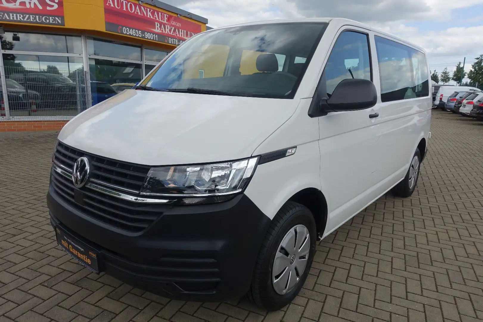 Volkswagen T6 Kombi T6.1  Bus*Klima*Zuheizer*8-Sitzer*Garantie 07/26 Weiß - 1