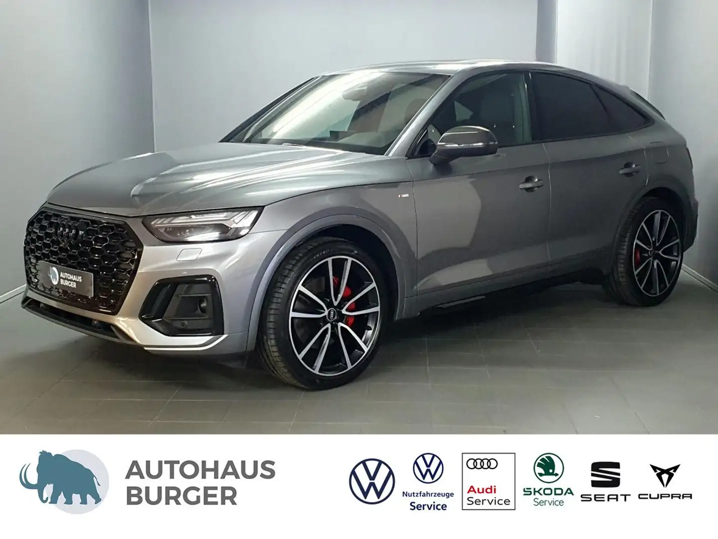 Audi Q5 Sportback 55TFSIe qu. S line/ABT/Pano/Luft Navi Grijs - 1