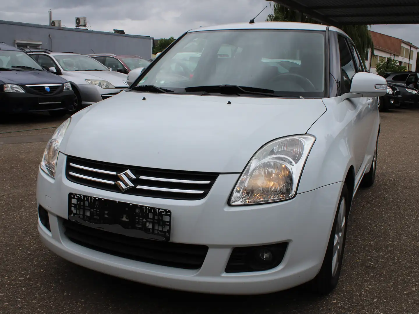 Suzuki Swift 1.3 Snow (5-trg.),TÜV 10.2026 Weiß - 1