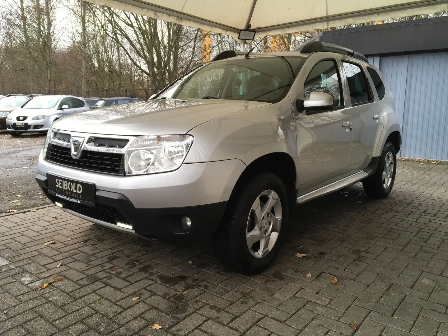 Dacia Duster I 1.5dCi Prestige 4x2/Leder/Bluetooth/PDC Silber - 1