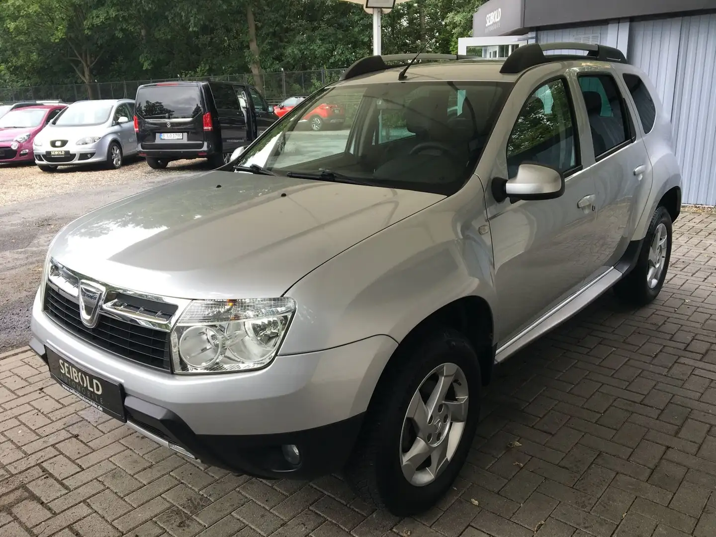 Dacia Duster I 1.5dCi Prestige 4x2/Leder/Bluetooth/PDC Silber - 1