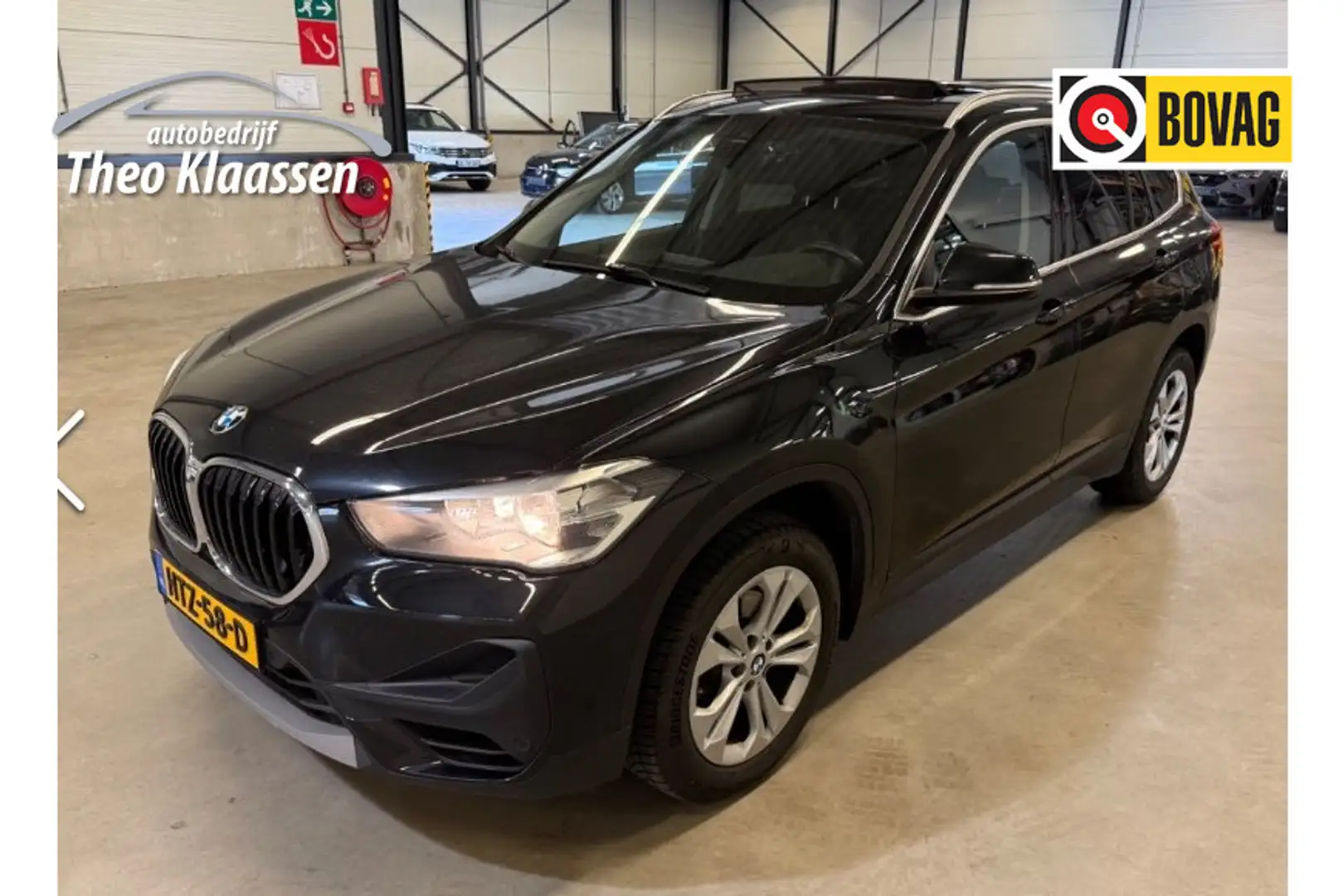 BMW X1 sDrive18i High Executive Panoramadak Leer Zwart - 1
