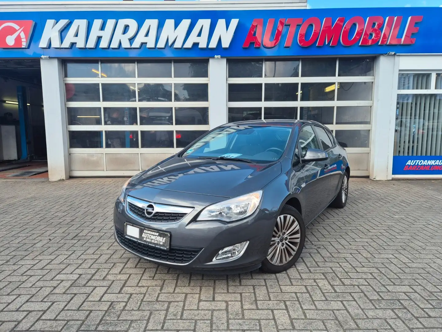 Opel Astra J Lim. 5-trg. Design Edition Gris - 1