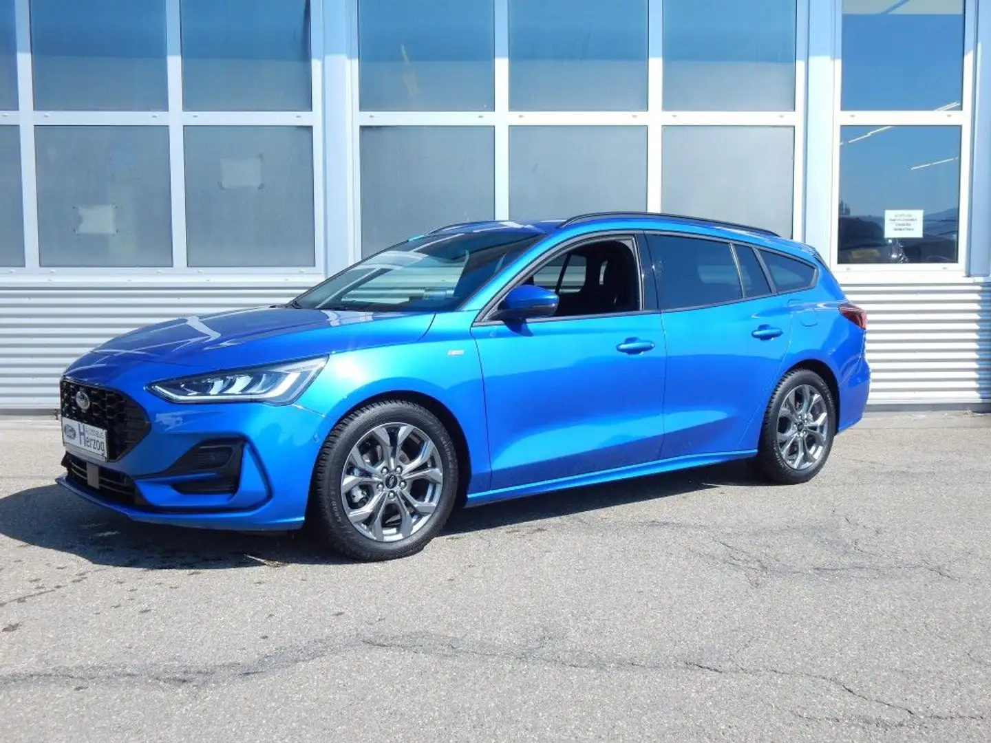 Ford Focus Turnier 1.0 EcoBoost Hybrid Aut. ST-LINE X Blauw - 1
