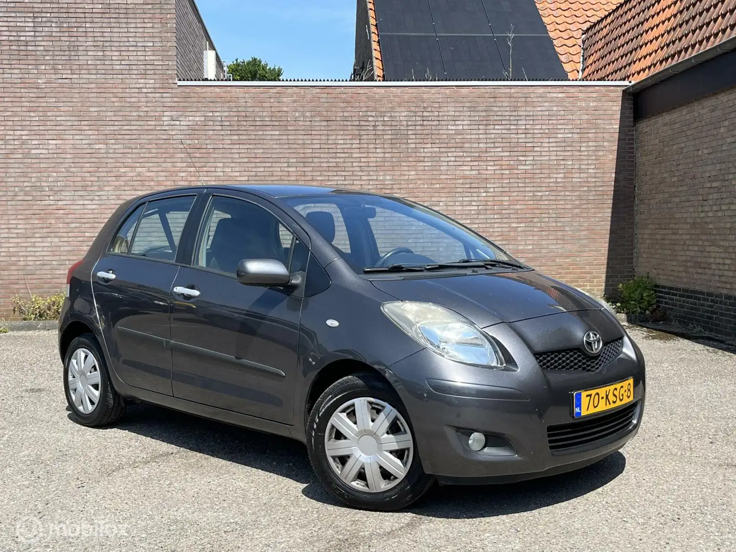 Toyota Yaris 1.3 VVTi Dynamic Limited | Airco|Org NL|Nwe APK Grijs - 2