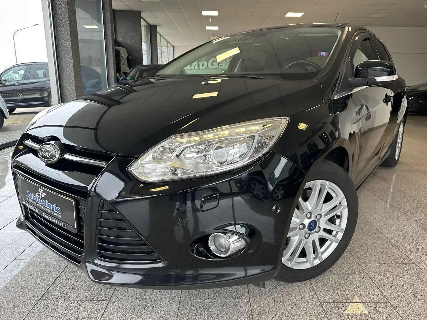Ford Focus Lim. Titanium Navi Kamera PDC BiXenon Schwarz - 1