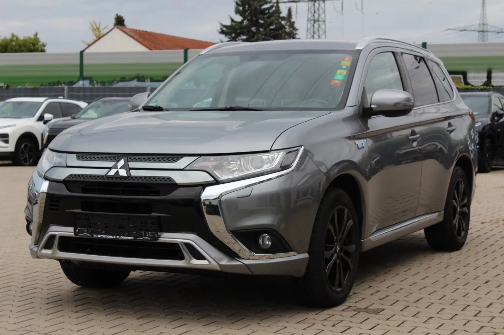 Mitsubishi Outlander 2.4 PHEV Basis Diamant 4WD AHK Navi Gris - 1