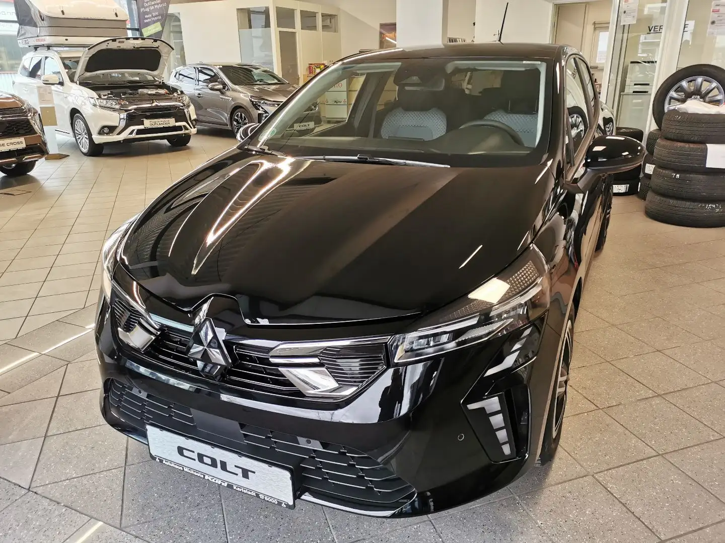 Mitsubishi Colt PLUS 1.6 Hybrid - 5 Jahre Werksgarantie Schwarz - 1