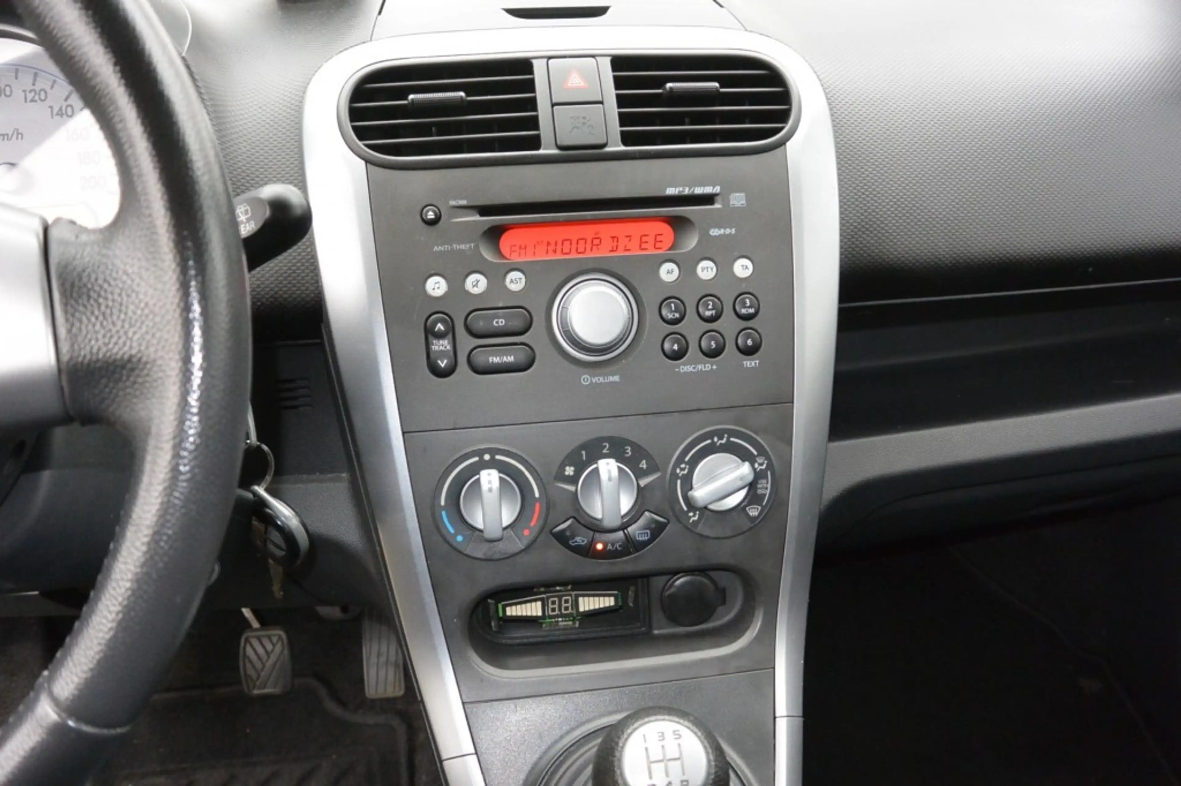 Suzuki Splash 1.0 Comfort Airco 5-deurs PDC — photo 16
