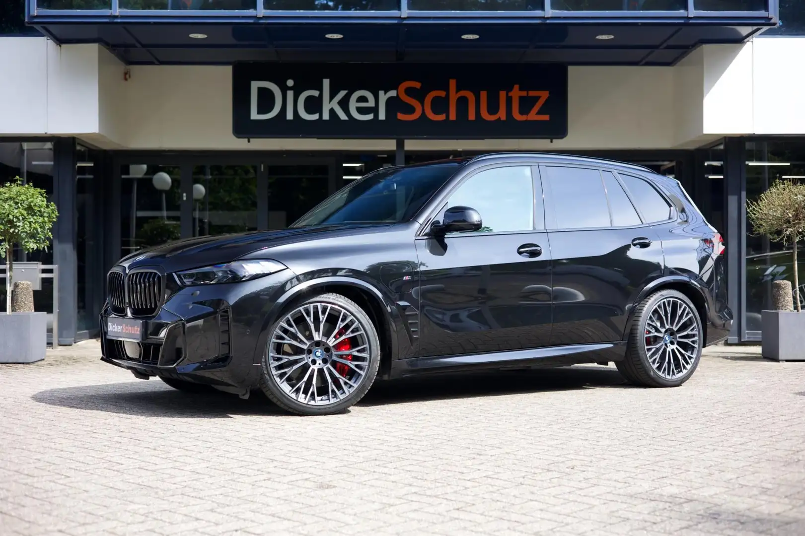 BMW X5 XDrive50e M Sport Pro | SkyLounge | B&W | Trekhaak Noir - 1