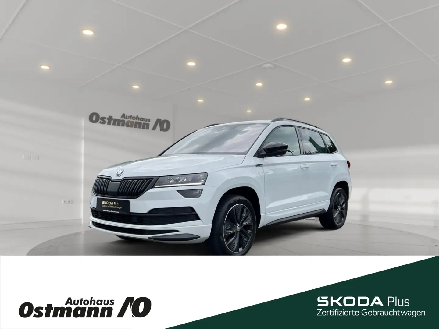 Skoda Karoq Sportline 110kw TSI DSG *AHK*SHZ*KESSY*RFK* Weiß - 1