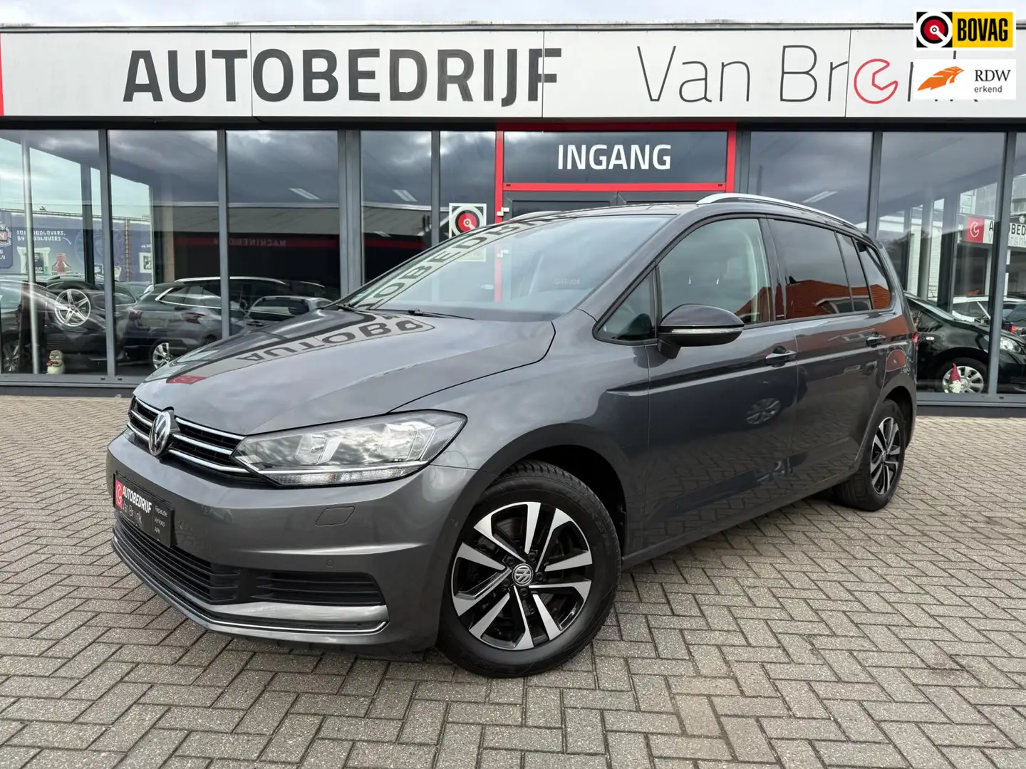 Volkswagen Touran 1.0 TSI Comfortline 7p | Navi | Carplay | PDC Grijs - 1