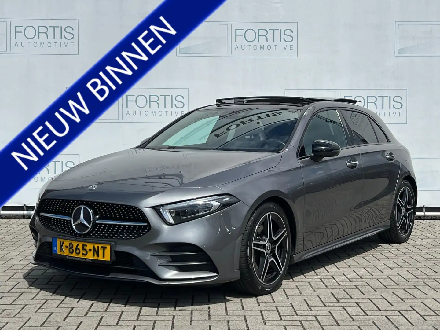 Mercedes-Benz A 180 Business Solution AMG NL AUTO | PANO | STOELVERW | Grijs - 1