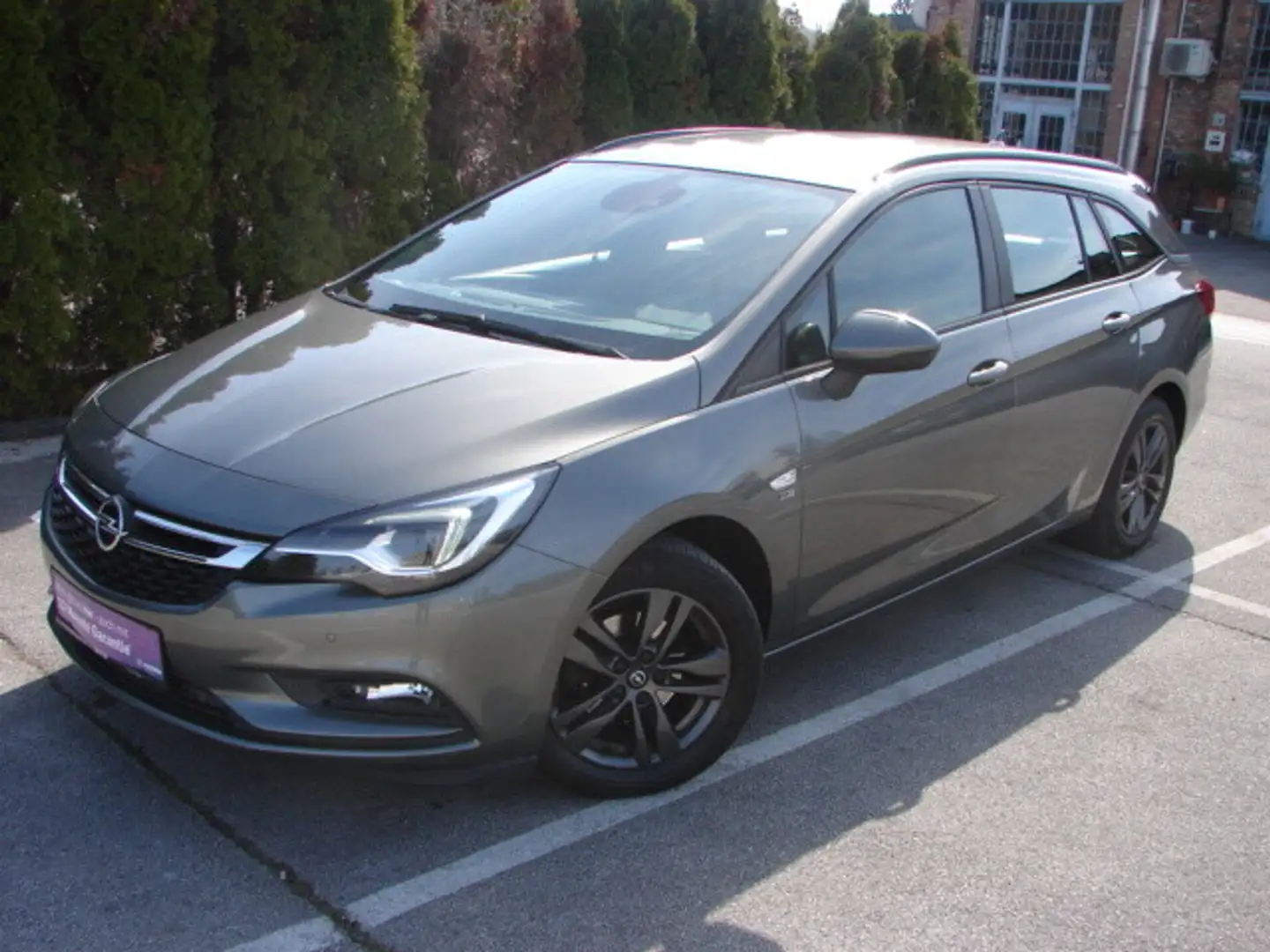 Opel Astra ST 1,4 Turbo Dir. Inj. St./St. 120 Jahre Edition Grau - 1
