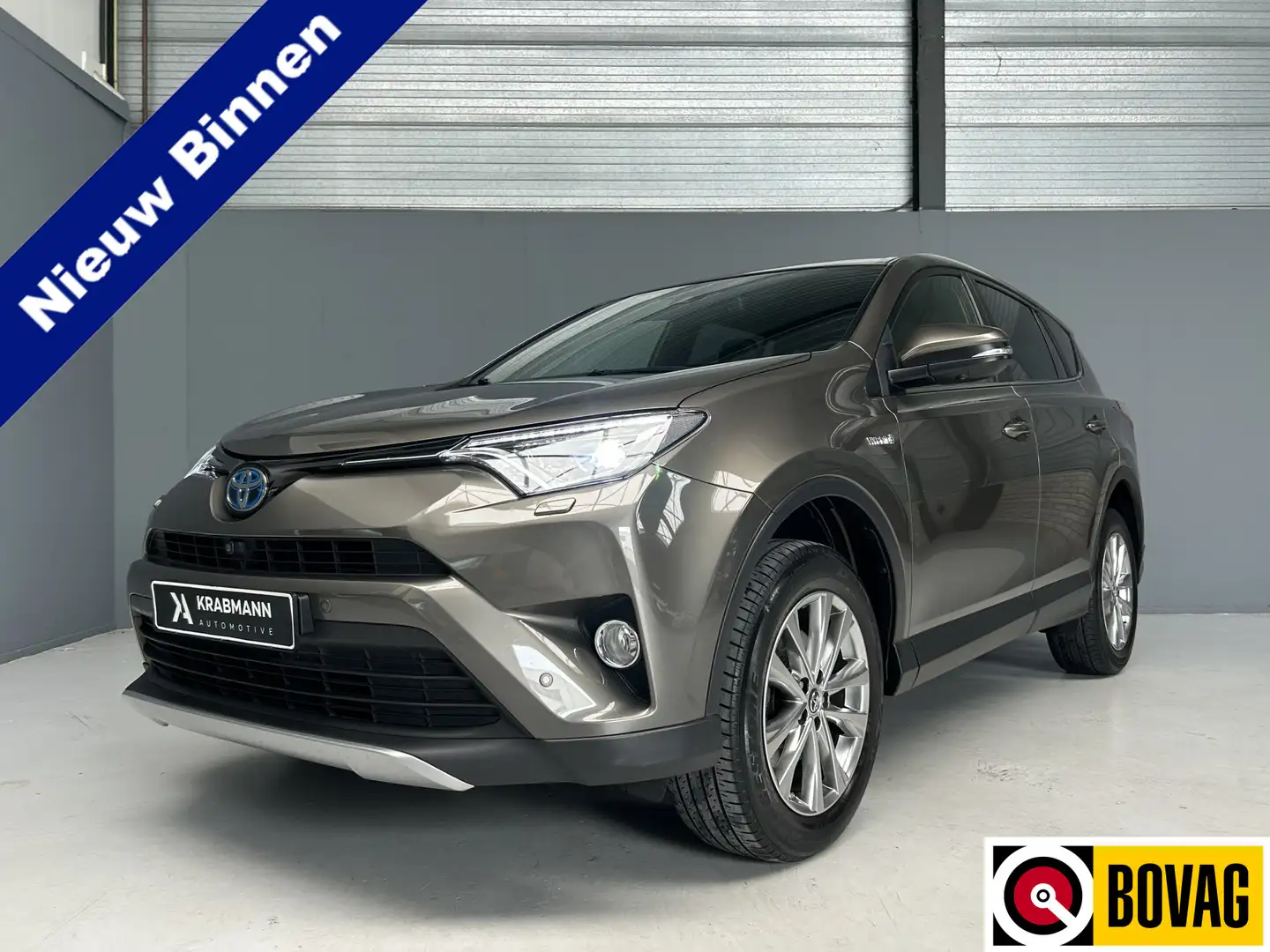 Toyota RAV 4 2.5 Hybrid AWD Executive Trekhaak|Leder|Navi|Cruis Bruin - 1