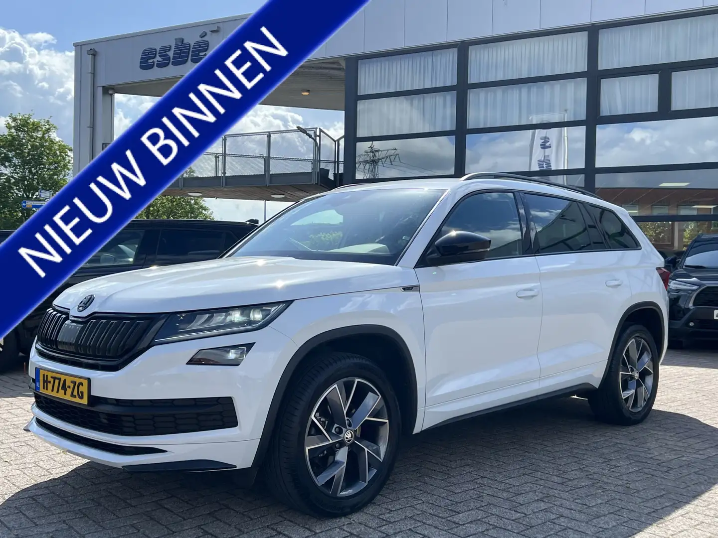 Skoda Kodiaq 1.5 TSI DSG Sportline Business Navigatie 19 Inch V Wit - 1