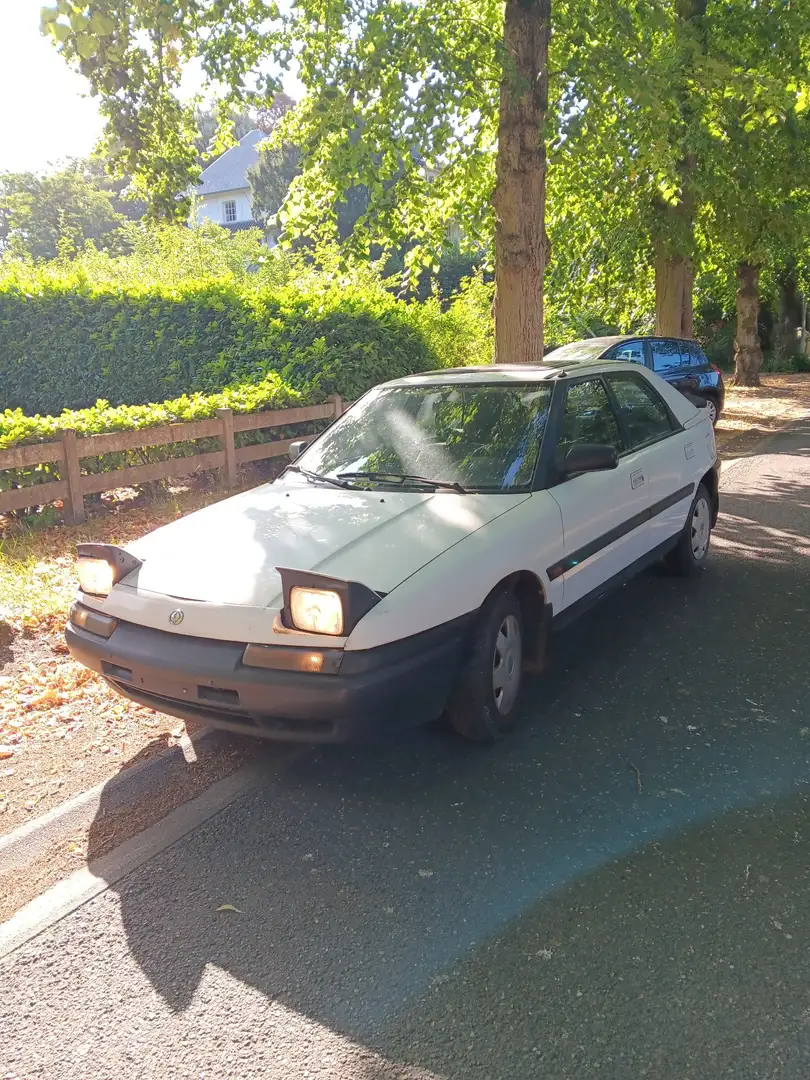 Mazda 323 1.6i GLX - 2