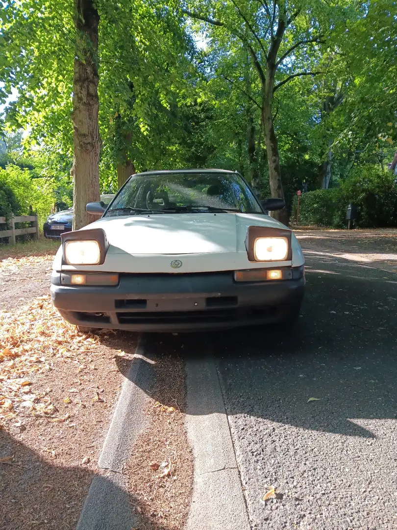 Mazda 323 1.6i GLX - 1
